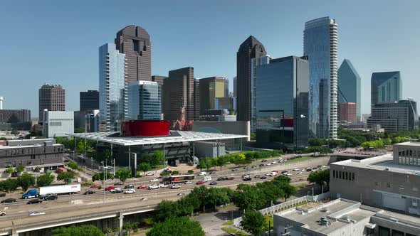 Downtown Dallas skyline city view. Aerial of traffic on interstate.