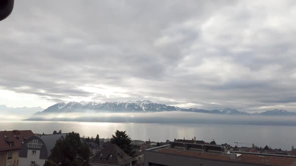 Panoramic timelapse: Leman Lake with clouds moving in the sky and a changing weather