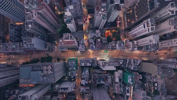 City centre traffic driving inHong Kong Island Central at night. Aerial drone view