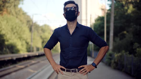 Businessman In Face Mask Protection Epidemic Coronavirus Lockdown On Train Station.Man In Face Mask