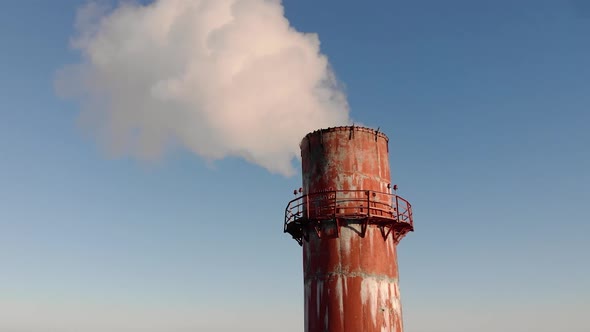 Industrial Pipes with Massive Smoke