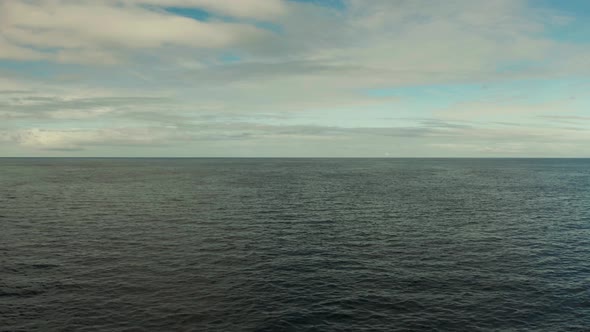 Seascape, Blue Sea, Sky with Clouds and Islands