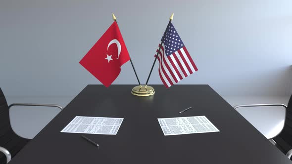 Flags of Turkey and the United States and Papers