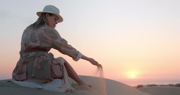 Stylish Model Enjoying Outdoor Travel and Desert Nature