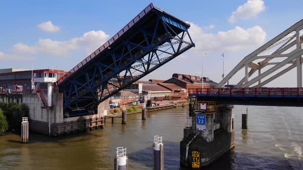 Alblasserdam Arch And Bascule Bridge Closing Its Single-leaf Over Noord River In Netherlands. - aeri