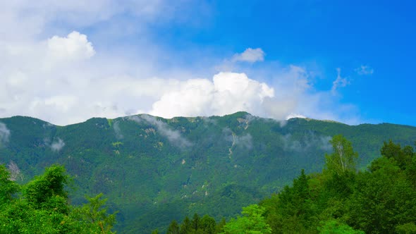 Alpine Mountains and Clouds