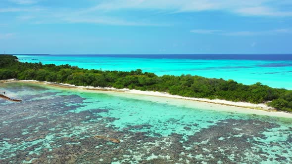 Aerial panorama of luxury bay beach adventure by blue green water with white sand background of a da