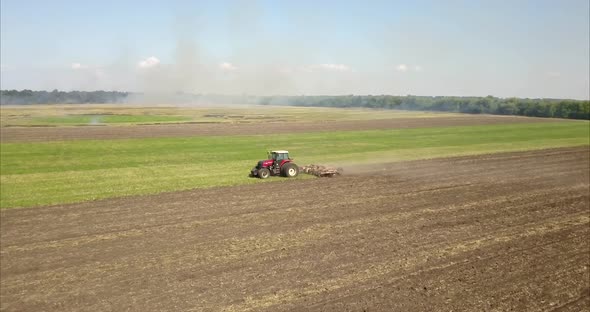 tractor cultivating soil