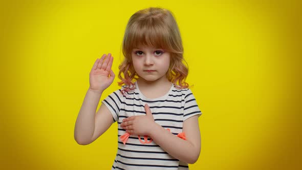 Child Kid Swear to Be Honest Aising Hand to Take Oath Promising to Tell Truth Keeping Hand on Chest