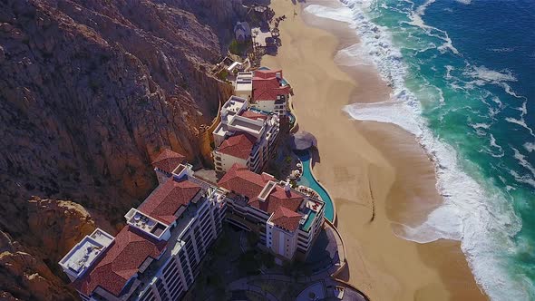 This is 4K drone footage of a resort, on the beach, in Cabo San Lucas Mexico. (24 fps)