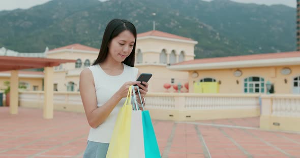 Woman holding shopping bag