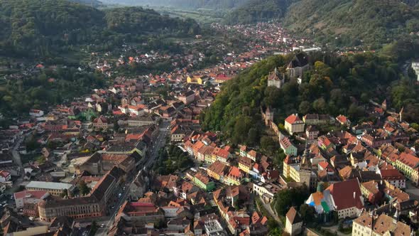 Aerial drone view of the Historic Centre of Sighisoara, Romania. Old buildings