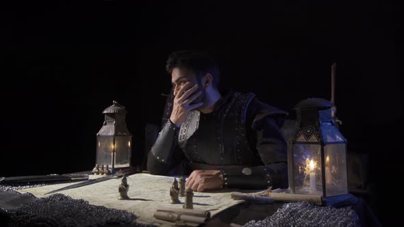 The commander playing with the locations of the stones on the map. alt