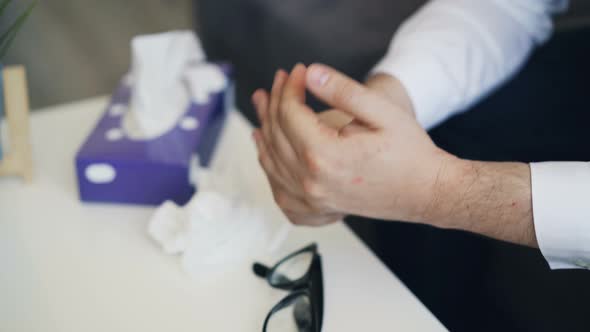 Close-up of Male Hands Moving Holding Tissue Expressing Anxiety and Depression