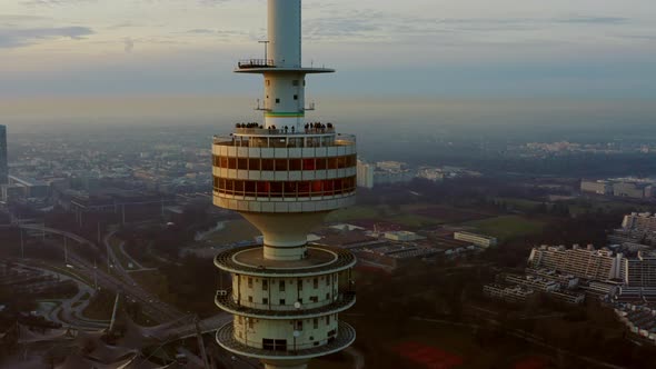 Aerial shot over Olympiaturm tower in Munich Germany