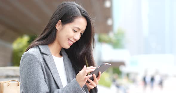 Woman use of mobile phone