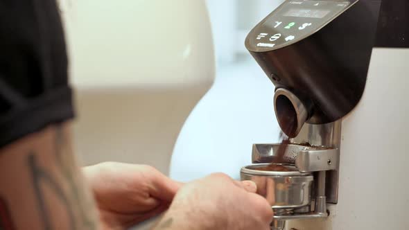 Barista Making Coffee in Coffeeshop