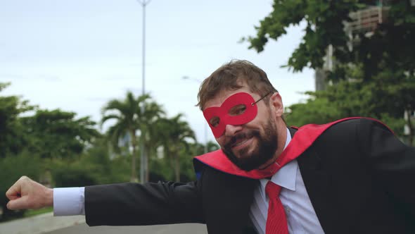 Happy Handsome Businessmanleader Manager Posing As Superhero Simulate Flying with Outstretched Hand