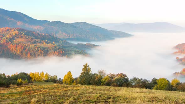 Morning Mist Over the Valley Among the Mountains in the Sunlight, Fog and Beautiful Nature of