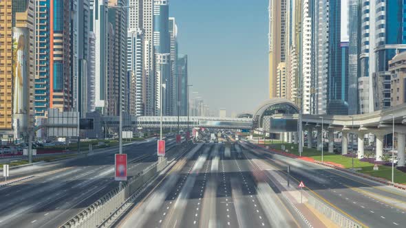 Busy Sheikh Zayed Road Timelapse Metro Railway and Modern Skyscrapers Around in Luxury Dubai City