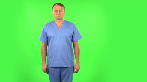 Medical Man Nods His Head Approvingly, Green Screen