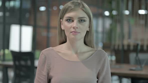 Portrait Shoot of Young Woman Looking at Camera