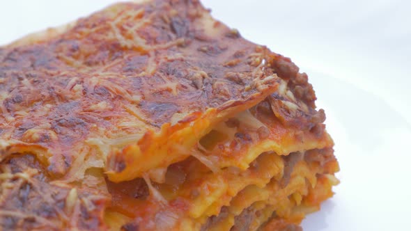 Lasagne on plate  traditional Italian cusine food 4K 2160p UHD panning   footage  - Lasagne food on 