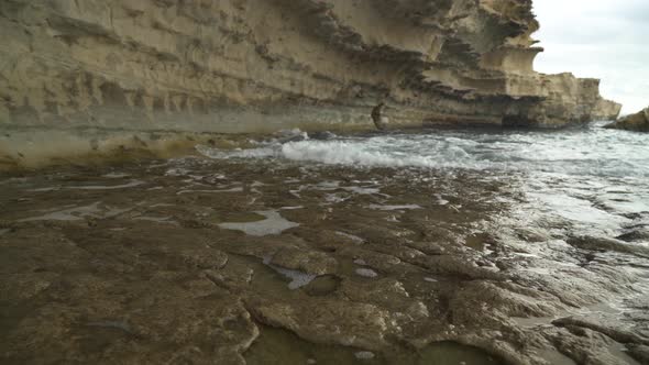 Foaming Water of Mediterranean Sea in Il-Kalanka Beach in Malta