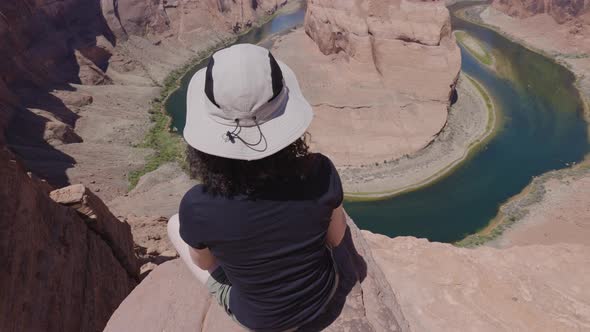 Adventurous Caucasian Woman at Horseshoe Bend in Page Arizona United States