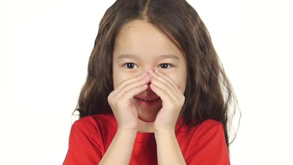 Close-up Little Girl Smile, Raises Hands and Screams. Slow Motion