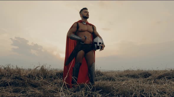 Handsome Spartan Posing in Dry Field, Sunset.