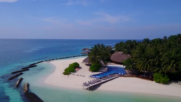 Aerial drone tourism of tourist beach by water and sand background