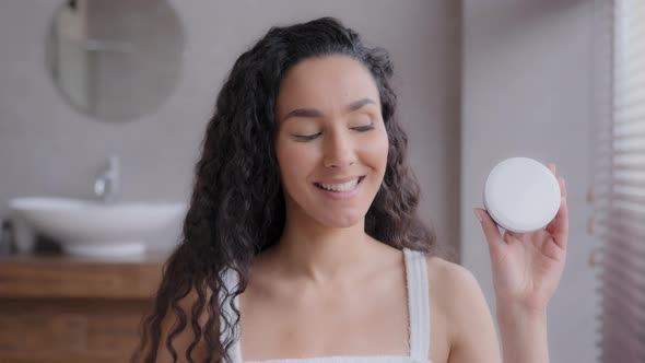 Closeup Young Attractive Happy Hispanic Woman Standing in Bathroom Looking at Camera Smiling