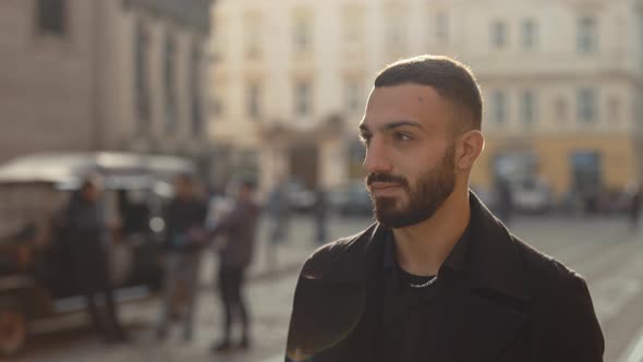 Muslim Man in Stylish Clothes Walking on City Street