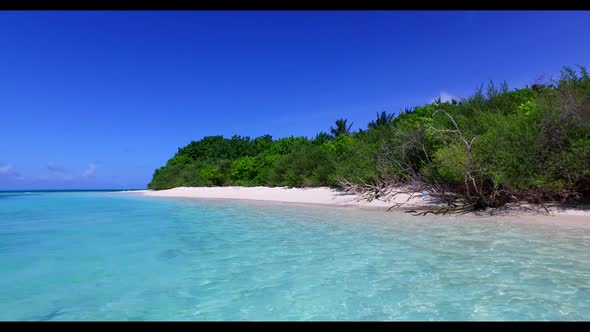 Aerial drone tourism of perfect shore beach break by aqua blue sea and white sand background of jour