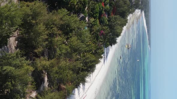 Vertical Video of the Ocean Near the Coast of Zanzibar Tanzania Aerial View