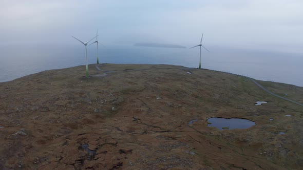 Aerial View of Wind Turbines and Ocean