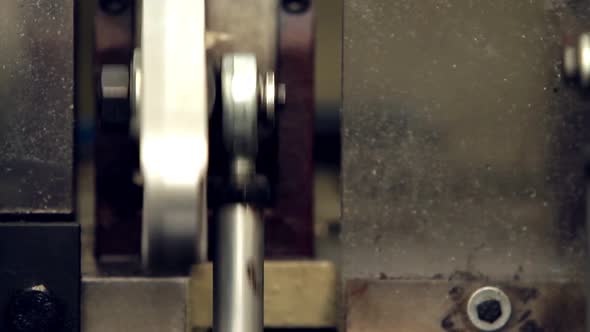 Crankshaft of an Industrial Machine on Motion.