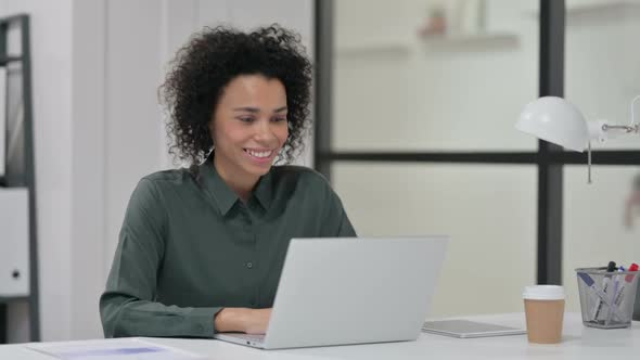 Online Video Chat on Laptop By African Woman