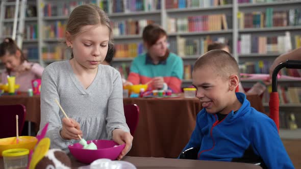 Girl Making Slime for Brother with Cerebral Palsy