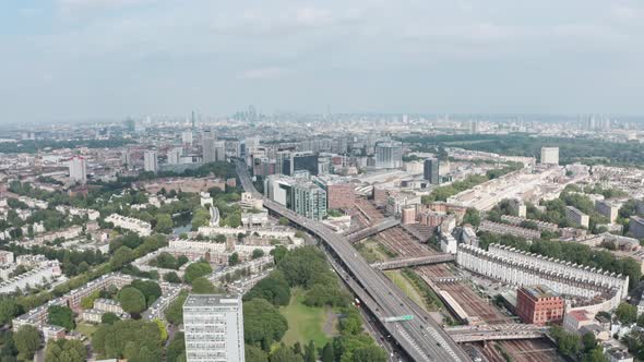 Slider drone shot over Westway ring road towards London paddington station