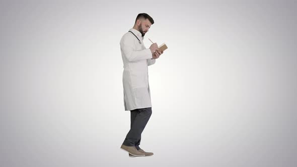 Doctor or Medic Man Holding Pen and Notebook Looking for Idea While Walking on Gradient Background