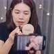 Beautiful Asian woman beauty blogger influencer makeup artist recording on smartphone. - VideoHive Item for Sale