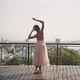 Ballerina Dances on Observation Deck Overlooking City - VideoHive Item for Sale