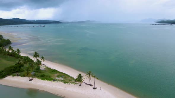 Couple Men and Women Walking on the Beach at the Island Koh Yao Yai Thailand Beach with White Sand