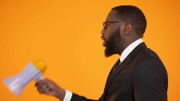 African-American Male Shouting to Megaphone, Sales and Discounts, Advertisement