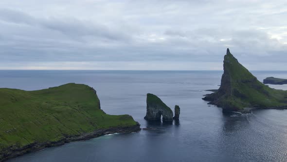 Drone Towards Drangarnir Sea Stacks In Faroe Islands