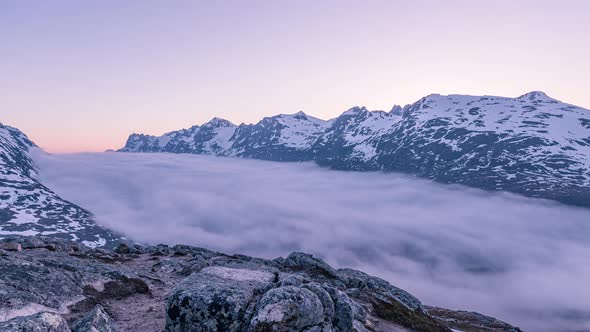 A time lapse of seemingly ghost town Ersfjordbotn and Ersfjord being uncovered of fog