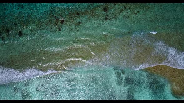 Aerial top view travel of tropical seashore beach time by blue sea with white sandy background of a 