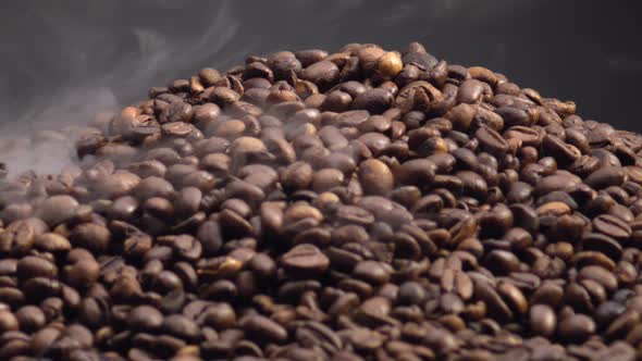 Closeup Steam Rising Over Coffee Seeds in Slow Motion